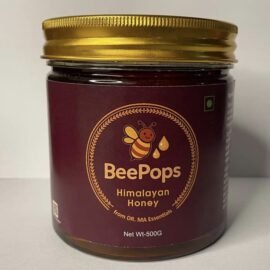 BeePops Himalayan Honey 500g jar with golden lid, maroon label featuring BeePops logo with a smiling bee logo, honey drops icon, and text ‘BeePops Himalayan Honey – from Dr. MA Essentials